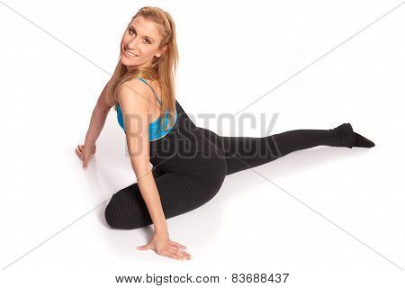 Young Sporty Woman In The Warm-up Workout