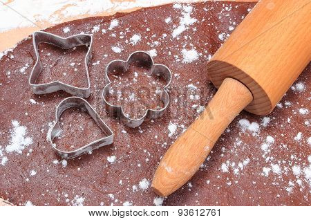 Cookie Cutters And Rolling Pin On Dough For Cookies