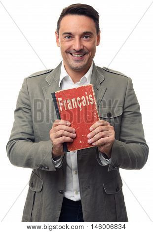 Smiling Handsome Man Holds English Textbook