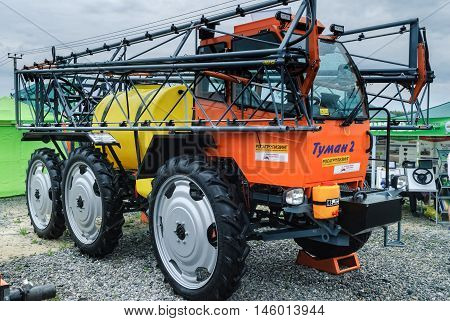 Tyumen, Russia - June 24, 2016: The 5th open championship of Russia on plowed land. Sprayer spreader self-propelled Tuman-2 for entering of fertilizer in liquid and granulated form
