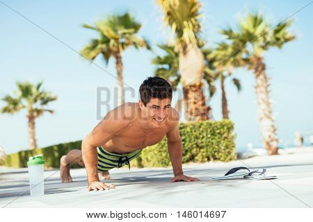 Doing Push Ups On The Beach