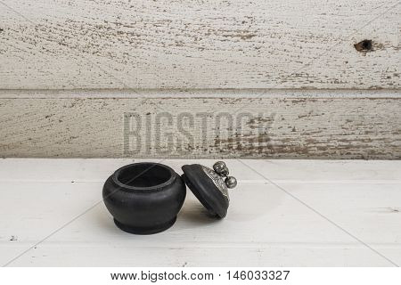 mini wooden handmade caskets on old wood background, souvenir of Chiengmai, Thailand