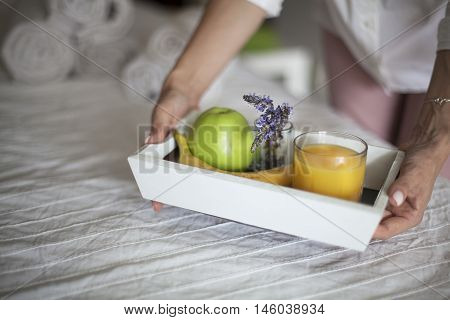 Breakfast in bed in hotel room. Accommodation.