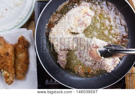 Chef deep fried pork in pan / cooking Japanese pork curry paste concept