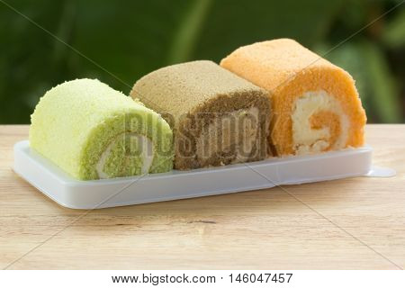 Three flavors jam rool cake on the tray