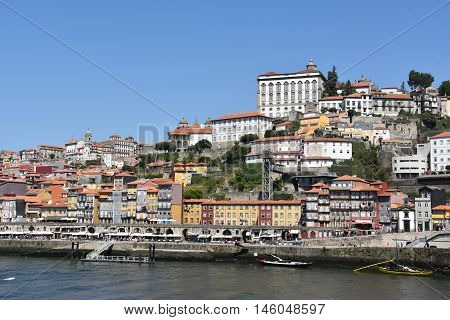 PORTO, PORTUGAL - AUG 22: Porto, on the river Douro, in Portugal, as seen on Aug 22, 2016. It is the second largest city in Portugal after Lisbon and a major urban area of the Iberian Peninsula.
