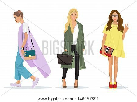 Set of beautiful young stylish women in fashion clothes with accessories. Detailed female characters. Fashion illustration.