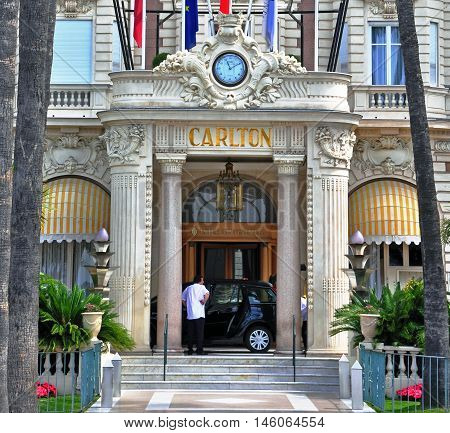 CANNES FRANCE - JUNE 18 2011: Facade of Carlton intercontinental hotel in Cannes France on June 18 2011. Carlton is luxury hotel chain around the world.