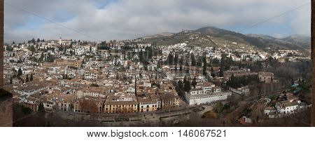 GRANADA, SPAIN - JANUARY 12, 2016: Panorama of El Albayzin district in Granada, Andalusia, Spain, pictured from the Nasrid Palaces in the Alhambra. 