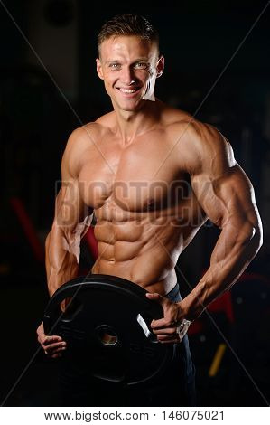Strong Athletic Man Fitness Model Showing Six Pack Abs