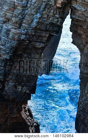 Natural Arches On Beach.