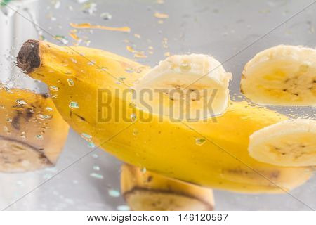 Slices of Banana Prata over a glass table
