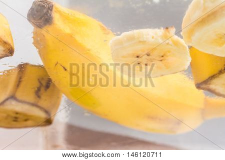 Slices of Banana Prata over a glass table