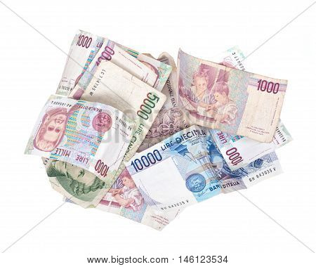 Itexit, italian lira currency bank notes separated on white background