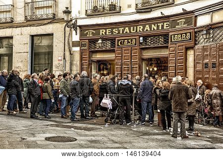Madrid-December 8: People standing near famous restaurant 