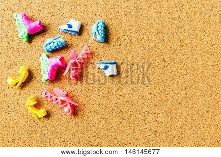 For beautiful background with cork board texture and girls toys