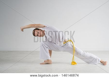 Man practicing Capoeira , brazilian martial Art.