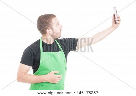 Young Supermarket Employee Taking Selfie