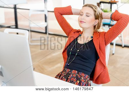 Young woman in office