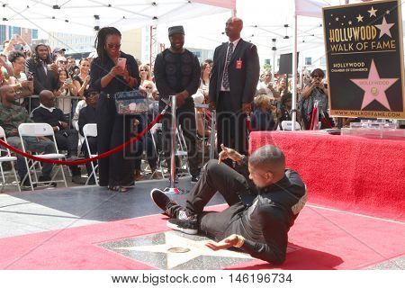 LOS ANGELES - SEP 7:  Usher Raymond at the Usher Honored With a Star On The Hollywood Walk Of Fame at the Eastown on September 7, 2016 in Los Angeles, CA