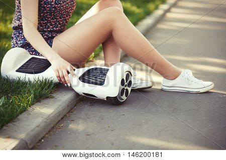 Girl With Electric Mini Hover Board Scooter Transport