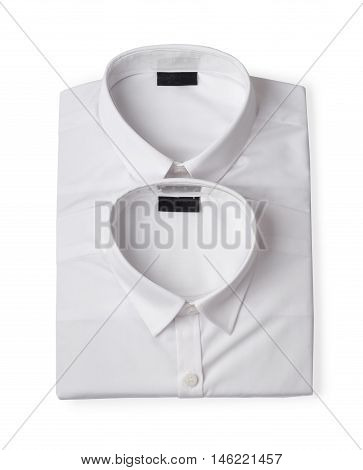 Two folded white new men's shirts close-up isolated on white background