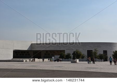 FATIMA, PORTUGAL - AUG 24: Sanctuary of Fatima in Portugal, as seen on Aug 24, 2016. It consists of a tall centralized bell-tower and nave, 213 ft in height, decorated by a 15,000 lb crown of bronze.