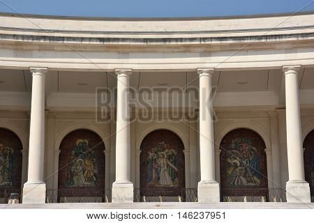 FATIMA, PORTUGAL - AUG 24: Sanctuary of Fatima in Portugal, as seen on Aug 24, 2016. It consists of a tall centralized bell-tower and nave, 213 ft in height, decorated by a 15,000 lb crown of bronze.