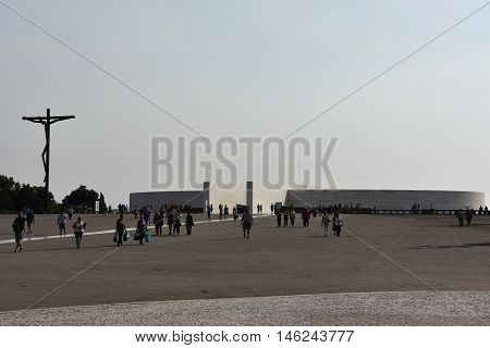 FATIMA, PORTUGAL - AUG 24: Sanctuary of Fatima in Portugal, as seen on Aug 24, 2016. It consists of a tall centralized bell-tower and nave, 213 ft in height, decorated by a 15,000 lb crown of bronze.