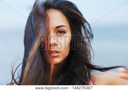 A Wonderful Portrait Of A Beautiful Young Girl With Long Gorgeous Hair, Close-up.