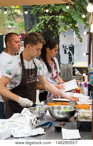 Odesa, Ukraine - August 06, 2016: chef is cooking meat on the 'Beerfest' event
