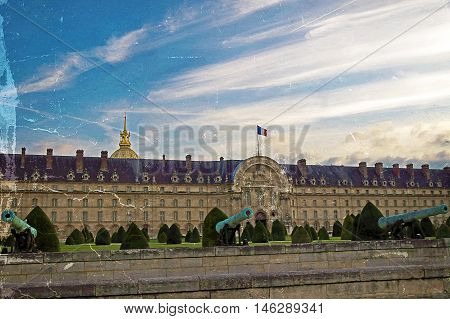 Vintage cannon in front at Les Invalides museum in Paris France. Vintage filter applied.