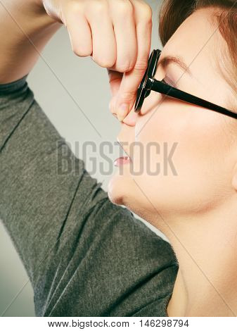 Girl Pinches Her Nose Because Of Stench Stink.