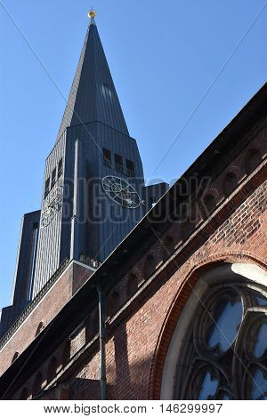 HAMBURG, GERMANY - AUG 25: St. James Church in Hamburg, Germany, as seen on Aug 25, 2016. It is located directly in the city center, has a 125m tall tower and features a famous organ by Arp Schnitger from 1693.