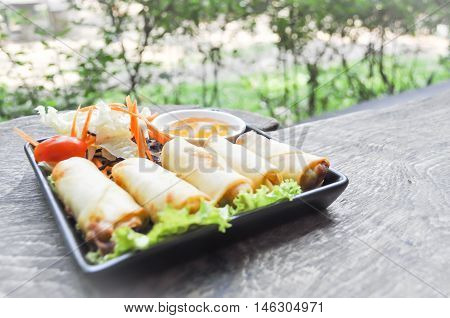 Spring roll with vegetable and dip dish