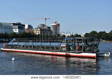 HAMBURG, GERMANY - AUG 26: Boats on Lake Alster in Hamburg, Germany, as seen on Aug 26, 2016. Hamburg was founded at the mouth of Alster river in the 9th century and has been used as a port since.