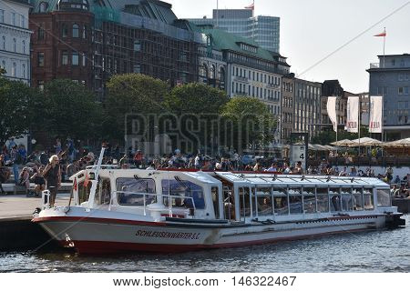 HAMBURG, GERMANY - AUG 26: Boats on Lake Alster in Hamburg, Germany, as seen on Aug 26, 2016. Hamburg was founded at the mouth of Alster river in the 9th century and has been used as a port since.