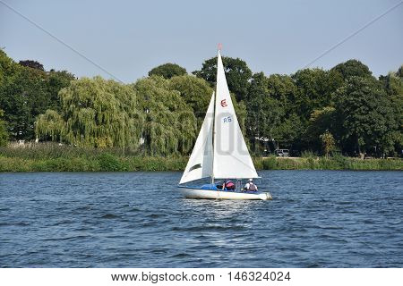 HAMBURG, GERMANY - AUG 26: Sailboats on Lake Alster in Hamburg, Germany, as seen on Aug 26, 2016. Hamburg was founded at the mouth of Alster river in the 9th century and has been used as a port since.