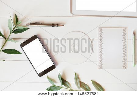 Styled Natural Eco Home Office. Smartphone, Tablet, Paper For Notes, Cd, Dvd With Copy Space On Whit