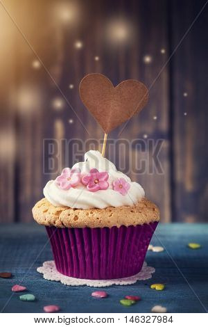 Cupcake with a heart cakepick
