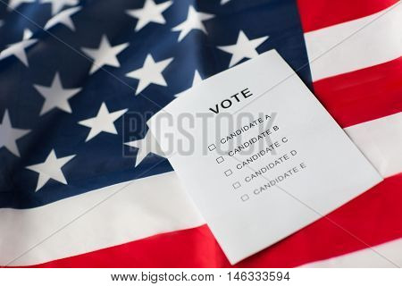 voting, election and civil rights concept - empty ballot or vote on american flag