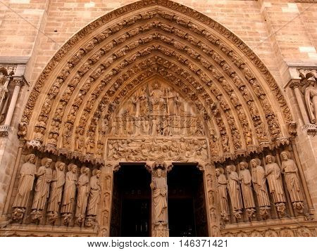 Arch over an entrance to a cathedral of Notre dame de Paris