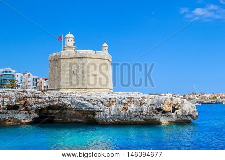 Castle of St. Nicholas or Castell de Sant Nicolau at the Ciutadella town port on a sunny summer day, Menorca island, Balearic islands, Spain.