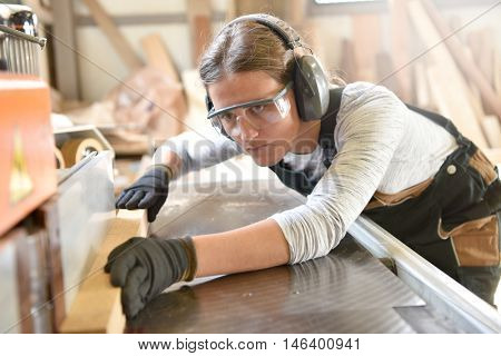 Young woman in crafstmanship school, training course