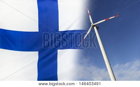 Concept clean energy with flag of Finland merged with wind turbine in a blue sunny sky