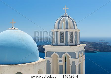 Blue roof church on Santorini island in Greece