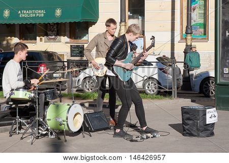 St. Petersburg, Russia-september 09,2016: The Street Musician Plays On The Street Of St. Petersburg.