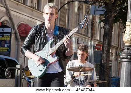 St. Petersburg, Russia-september 09,2016: The Street Musician Plays On The Street Of St. Petersburg.