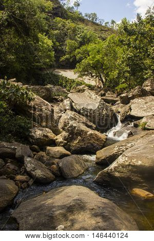 Water Falls Between Rocks In Sunny Day - Serra Da Canastra National Park - Minas Gerais, Brazil