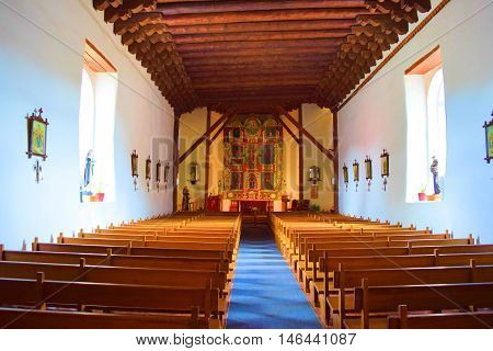 August 29, 2016 in Santa Fe, NM:  San Miguel Mission Chapel built between 1610 and 1626 with Spanish Colonial architectural design which is the oldest church in the United States and where people can worship today taken in Santa Fe, NM